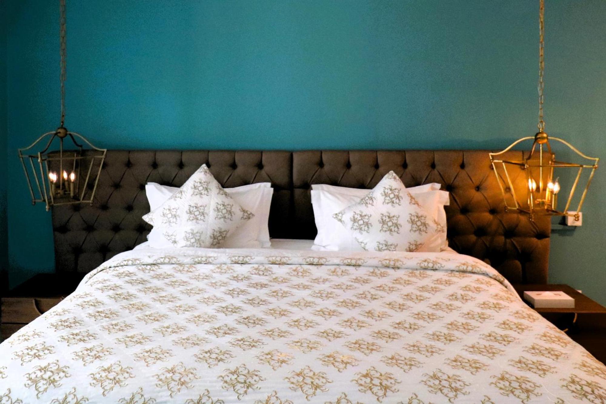 Lagoona Beach Luxury Resort And Spa Manáma Exteriér fotografie A bed with a duvet